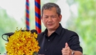 This handout photo taken and released by Agence Kampuchea Press (AKP) on April 11, 2026 shows Cambodia痴 Prime Minister Hun Manet speaking during the groundbreaking ceremony for the construction of the Funan Techo canal project section 2 in Takeo province. (Photo by Handout / Agence Kampuchea Press (AKP) / AFP)