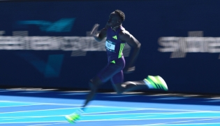 Australia's Gout Gout competes in the men's 200M heats at the Australian Athletics Championships in Sydney on April 12, 2026. (Photo by David Gray / AFP)