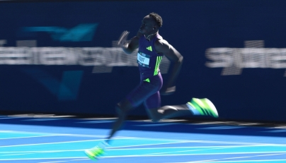Australia's Gout Gout competes in the men's 200M heats at the Australian Athletics Championships in Sydney on April 12, 2026. (Photo by David Gray / AFP)