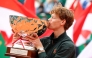 Italy's Jannik Sinner celebrates after winning the Monte Carlo ATP Masters Series Tournament final tennis match against Spain's Carlos Alcaraz on Court Rainier III at the Monte-Carlo Country Club in Roquebrune-Cap-Martin, south-eastern France on April 12, 2026. (Photo by Valery HACHE / AFP)