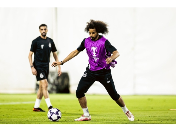 Al Sadd's Akram Afif and Hassan Al Haydos (left) train ahead of the match against Al Hilal SFC.