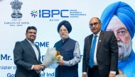 India's Minister of Petroleum and Natural Gas, H E Hardeep Singh Puri with the Ambassador of India to Qatar, H E Vipul and the President of IBPC Qatar,  Thaha Muhammed Abdul Kareem during the event.