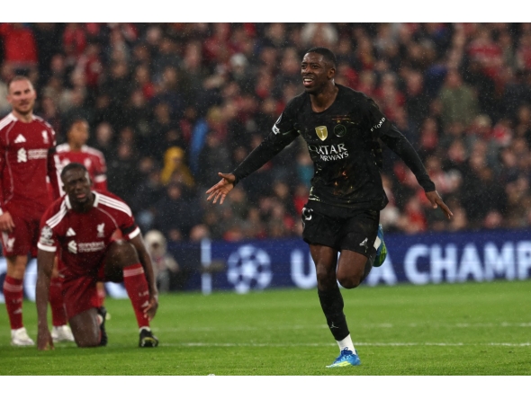 Paris Saint-Germain's French forward #10 Ousmane Dembele celebrates scoring his team's first goal during the UEFA Champions League quarter final, second-leg football match between Liverpool and Paris Saint-Germain at Anfield in Liverpool, north west England on April 14, 2026. (Photo by FRANCK FIFE / AFP)