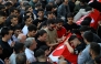 Family members and mourners attend the funerals for nine victims killed in a school shooting at the Abdulhamid Han Mosque in the southern province of Kahramanmaras on April 16, 2026. (Photo by Yasin Akgul / AFP)