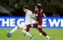 Al Sadd’s Agustín Soria (left) vies for the ball with a Vissel Kobe player during the quarter-final tie.