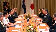 Australia's Deputy Prime Minister and Minister for Defence Richard Marles (2nd R) speaks with Japan's Minister of Defense Koizumi Shinjiro (3rd L) during a Defence Ministers' Meeting in Melbourne on April 18, 2026. (Photo by William West / AFP)
 