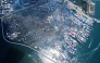 This handout photo taken and released by Malaysia's Sandakan Fire and Rescue Department on April 19, 2026, shows a general view of the Kampung Bahagia water village after a fire, in Sandakan, on Malaysia's Borneo island. (Photo by Handout / Malaysia's Sandakan Fire and Rescue Department / AFP)