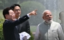 South Korea's President Lee Jae Myung (L) gestures alongside India's Prime Minister Narendra Modi (R) as they plant a tree during a meeting at the Hyderabad House in New Delhi on April 20, 2026. (Photo by Sajjad HUSSAIN / AFP)