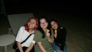 Gwyneth Estomo (GU’27), Lovie Francia (GU-Q’29), and Daphne Soriano (GU-Q’28) during an iftar on March 18, 2026.