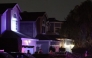 FBI tactical agents leave a house associated with the suspected White House Correspondents’ Dinner shooter after making entry at the residence in Torrance, California, late on April 25, 2026. Photo by Patrick T. Fallon / AFP