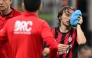 AC Milan's Croatian midfielder #14 Luka Modric leaves the pitch after being injured during the Italian Serie A football match between AC Milan and Juventus FC at the San Siro stadium in Milan, northern Italy, on April 26, 2026. (Photo by Stefano RELLANDINI / AFP)