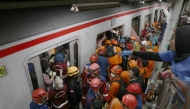 Rescuers work at the train accident site in Bekasi, Indonesia. A commuter train on the Jakarta-Bekasi route was involved in a collision with a long-distance train operating on the Jakarta-Surabaya route at around 8:50pm local time on Monday. (Photo by B. Nugraha/Xinhua)