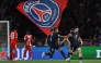 Paris Saint-Germain's Georgian forward #07 Khvicha Kvaratskhelia (R) celebrates with Paris Saint-Germain's French midfielder #14 Desire Doue after scoring his team first goal during the UEFA Champions League semi-final first leg football match between Paris Saint-Germain (PSG) and Bayern Munich at the Parc des Princes in Paris on April 28, 2026. (Photo by Anne-Christine POUJOULAT / AFP)