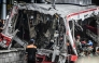 INDONESIA-RAIL-ACCIDENT
Workers clear debris at the train collision site after the locomotive of a passenger train pierced through the rear car of a commuter train at Bekasi Timur Station in Bekasi, West Java on April 28, 2026. 
(Photo by Rezas / AFP)