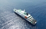 This aerial picture shows a general view of the cruise ship MV Hondius stationary off the port of Praia, the capital of Cape Verde, on May 4, 2026. Photo by AFP