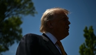 US President Donald Trump speaks to the press before walking to board Marine One as he departs from the South Lawn of the White House in Washington, DC, on May 12, 2026. (Photo by Kent Nishimura / AFP)
 