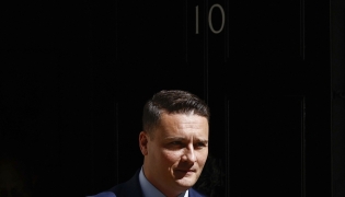 Britain's Health Secretary Wes Streeting leaves Number 10 Downing Street after attending a cabinet meeting in central London on May 12, 2026. Photo by BROOK MITCHELL / AFP
