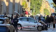 Police work at the scene after a driver injured seven people, two of them badly, when he drove on a sidewalk in Modena on May 16, 2026. (Photo by AFP) 