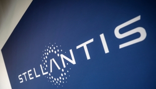 (Files) This photograph shows the Stellantis logo at the Stellantis multinational car manufacturer's plant in Poissy, west of Paris on April 16, 2026. (Photo by Simon Wohlfahrt / AFP)
