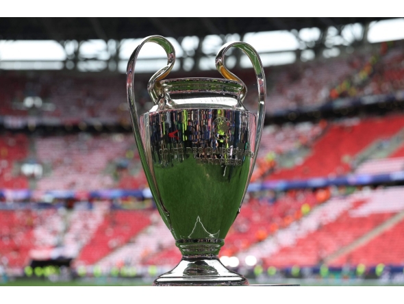 The trophy is displayed on the pitch prior to the UEFA Champions League final football match between Paris Saint-Germain (PSG) and Arsenal FC at the Puskas Arena in Budapest on May 30, 2026. (Photo by FRANCK FIFE / AFP)