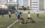 (Files) Football students play a game during practice at the Bola Pra Frente (Ball Forward) football academy in Praia, on May 18, 2026. (Photo by Patrick Meinhardt / AFP)