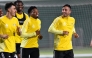 Al Gharafa players attend a training session in this file photo.
