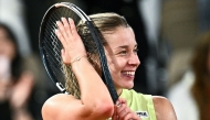 Poland's Maja Chwalinska celebrates after winning against Russia's Diana Shnaider at the end of their women's semi final singles match on day 12 of the French Open tennis tournament on Court Philippe-Chatrier at the Roland-Garros Complex in Paris on June 4, 2026. (Photo by JULIEN DE ROSA / AFP)
