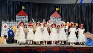 Pakistan International School Qatar's KG students perform during the event.