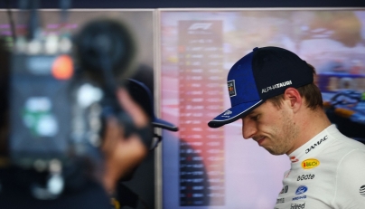 Red Bull Racing's Dutch driver Max Verstappen reacts after taking the car back to the garage as he withdraws from the race during Monaco Formula 1 Grand Prix at the Monaco street circuit in Monaco, ahead of the, on June 7, 2026. Photo by Yves Herman / POOL / AFP