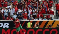 Morocco's Brahim Diaz celebrates with teammate Achraf Hakimi after scoring a goal against Norway during a friendly match on Sunday. (AFP)