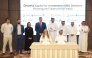 Ambassador of Ukraine to Qatar H E Andrii Kuzmenko and QC Board Member Mohamed bin Ahmed Al Obaidli with other officials witnessing the signing by Chairman of GrowthX Capital Hamad Mubarak Al Hajri and President of Grow Solutions Maria Shevchenko.