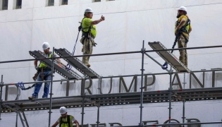 Construction crews build scaffolding outside The Kennedy Center on June 13, 2026 in Washington, DC. Friday marks the court-ordered deadline to remove President Donald trump's name from the Kennedy Center. (Photo by TASOS KATOPODIS / GETTY IMAGES NORTH AMERICA / Getty Images via AFP)