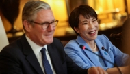 Britain's Prime Minister Keir Starmer (L) and Japan's Prime Minister Sanae Takaichi attend a business roundtable meeting at Downing Street in central London on June 14, 2026. (Photo by Toby Shepheard / POOL / AFP)