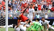 SEATTLE, WASHINGTON - JUNE 15: Romelu Lukaku #9 of Belgium forces an own goal by Mohamed Hany #3 of Egypt during the FIFA World Cup 2026 Group G match between Belgium and Egypt at Seattle Stadium on June 15, 2026 in Seattle, Washington. (Photo by ALEX GRIMM / GETTY IMAGES NORTH AMERICA / Getty Images via AFP)
