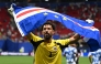 Cape Verde's goalkeeper #01 Vozinha celebrates with his national flag at the end of the 2026 World Cup Group H football match between Spain and Cape Verde at the Atlanta Stadium in Atlanta on June 15, 2026. (Photo by ROBERTO SCHMIDT / AFP)
