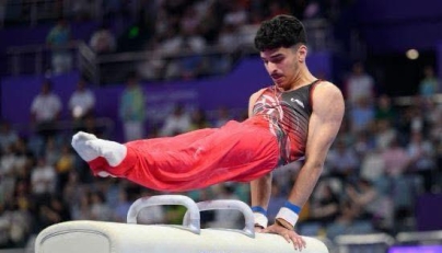 Rakan Al Harith competes during the Pommel Horse event. 