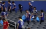 Japan fans clear trash in the stands during the FIFA World Cup 2026 match at Dallas Stadium on June 14, 2026 in Arlington, Texas. Michael Steele/Getty Images/AFP 