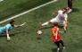 Iran's goalkeeper #01 Alireza Beiranvand makes a save past Belgium's defender #05 Maxim De Cuyper during the 2026 World Cup Group G football match between Belgium and Iran at the Los Angeles Stadium in Inglewood on June 21, 2026. (Photo by Etienne Laurent / AFP)