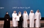 Undersecretary of the Ministry of Awqaf and Islamic Affairs Sheikh Khalid bin Mohammed bin Ghanem Al Thani honours a graduate during the ceremony, while Undersecretary of the Ministry of Education and Higher Education Dr. Ibrahim bin Saleh Al Nuaimi, looks on. Pic: Salim Matramkot/The Peninsula