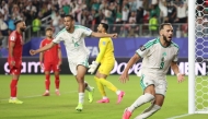 Amine Gouiri #9 of Algeria celebrates scoring his team's second goal during the FIFA World Cup 2026 Group J match between Jordan and Algeria at San Francisco Bay Area Stadium on June 22, 2026 in Santa Clara, California. Stu Forster/Getty Images/AFP 
