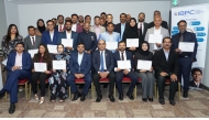 Ambassador of India to Qatar H E Shri Vipul; President of IBPC Qatar Thaha Muhammed Abdul Kareem with other officials and graduates during the programme series.