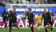 Canada's midfielder #07 Stephen Eustaquio celebrates scoring his team's first goal during the 2026 World Cup round of 32 football match between South Africa and Canada at the Los Angeles Stadium in Inglewood on June 28, 2026. (Photo by Patrick T. Fallon / AFP)