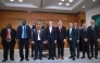 Vanuatu's Trade and Commerce Minister Samson Samsen, Foreign Minister Marc Ati, and Prime Minister Jotham Napat pose for a group photo after an agreement signing ceremony with Australian Prime Minister Anthony Albanese, Defence Minister Richard Marles, Foreign Minister Penny Wong, Minister for Defence Industry and Pacific Island Affairs Pat Conroy, Minister for Climate Change and Energy Chris Bowen, and Minister for Immigration and Citizenship Tony Burke at Parliament House in Canberra on June 29, 2026. (Photo by DAVID GRAY / AFP)