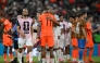 Netherlands' forward #11 Cody Gakpo is consoled by Morocco's defender #03 Noussair Mazraoui after losing the penalty shootout. (Photo by Alfredo Estrella / AFP)
 