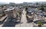 This aerial view shows a heavily damaged coastal area with collapsed buildings and debris following the June 24 twin earthquakes in Caraballeda, La Guaira State, Venezuela, on June 29, 2026. (Photo by Yorman Maldonado/ AFP)