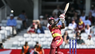 West Indies' Deandra Dottin plays a shot during the ICC Women's T20 cricket world cup 2026 semi-final game between Australia and West Indies, at The Oval in London on June 30, 2026. (Photo by JUSTIN TALLIS / AFP)