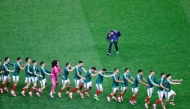 Mexico's players celebrate after winning the 2026 World Cup round of 32 football match between Mexico and Ecuador at the Mexico City Stadium in Mexico City on June 30, 2026. (Photo by Rodrigo Oropeza / AFP)