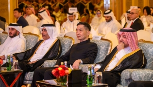 Minister of State H E Essa bin Hilal Al Kuwari (second left), Ambassador of China H E Cao Xiaolin (third left) and Director of the Department of Protocol of the Ministry of Foreign Affairs H E Ibrahim Yousif Abdullah Fakhro (right) during the event.