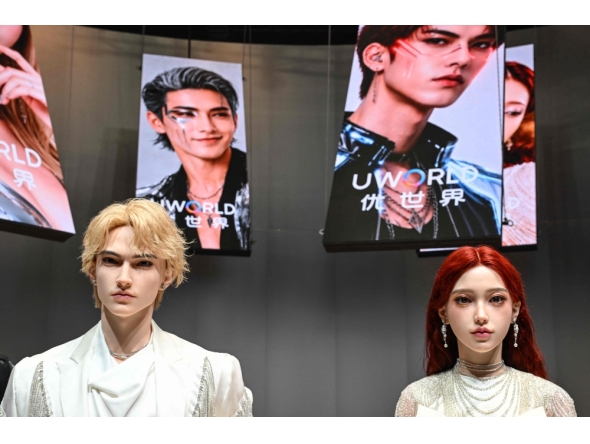 Humanoid robots are displayed during the launch of the U1 humanoid robot produced by UWORLD, a brand under UBTECH Robotics on June 30, 2026. (Photo by Adek Berry / AFP)