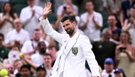 Serbia's Novak Djokovic waves as he leaves the court after winning Greece's Stefanos Tsitsipas during their men's singles second round tennis match on the third day of the 2026 Wimbledon Championships at The All England Lawn Tennis and Croquet Club in Wimbledon, southwest London, on July 1, 2026. (Photo by Kirill KUDRYAVTSEV / AFP)

